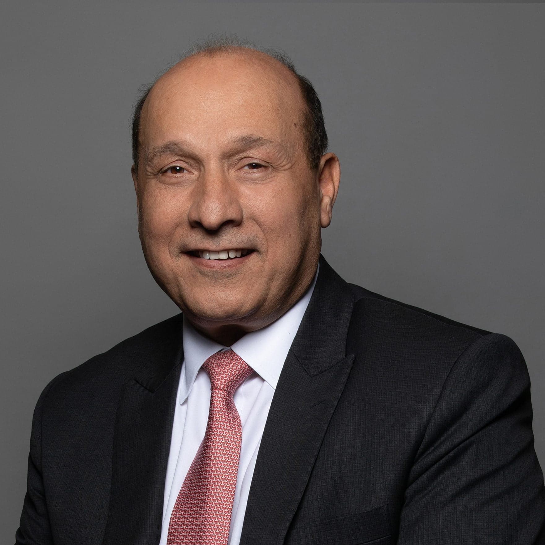 What is the story behind the success of billionaire Surinder Arora?