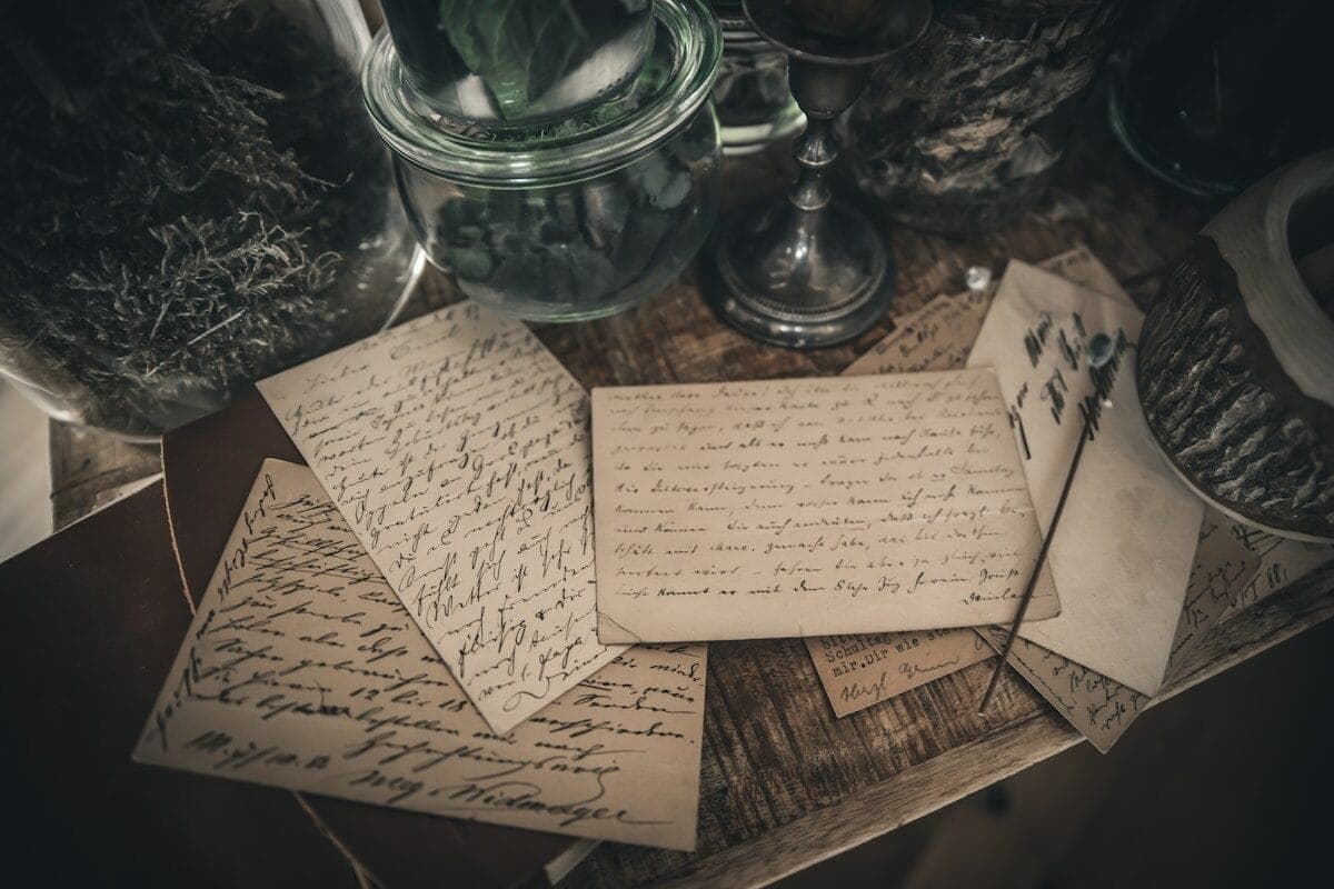 white printer paper on brown wooden table